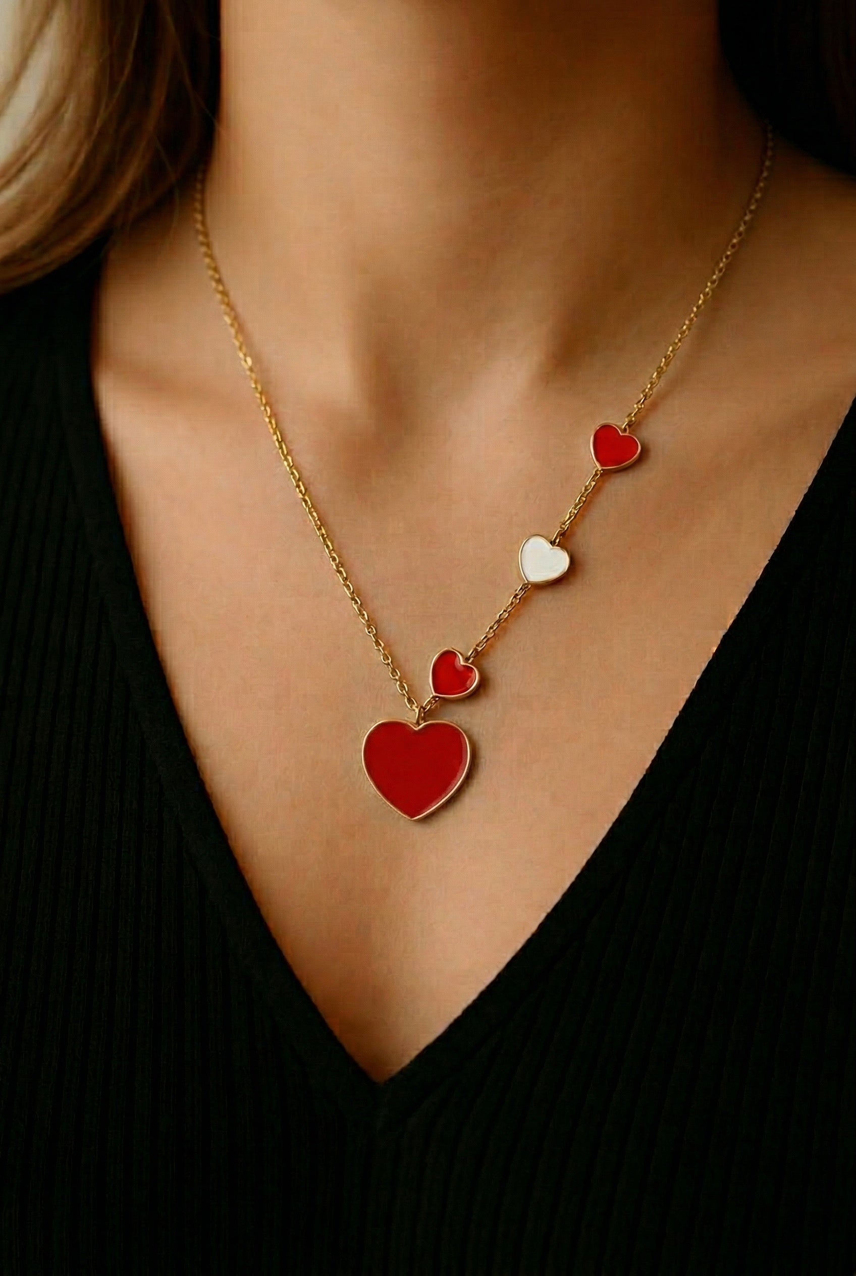 Four‑Heart Gold Necklace